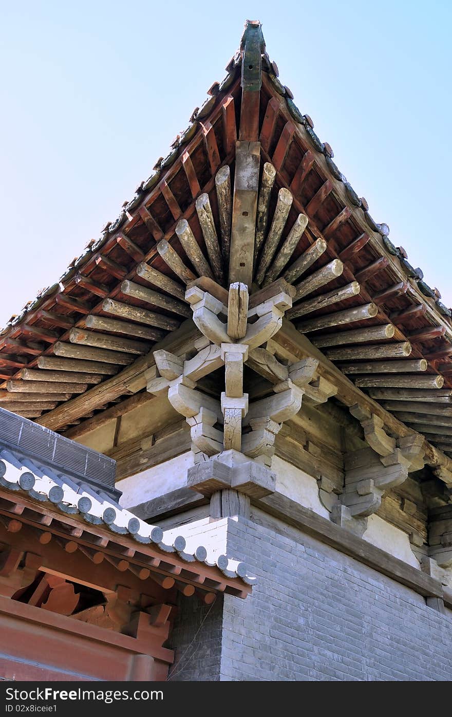 Featured structure and elaborate of a Chinese old temple, shown as traditional architecture style and detail. Featured structure and elaborate of a Chinese old temple, shown as traditional architecture style and detail.