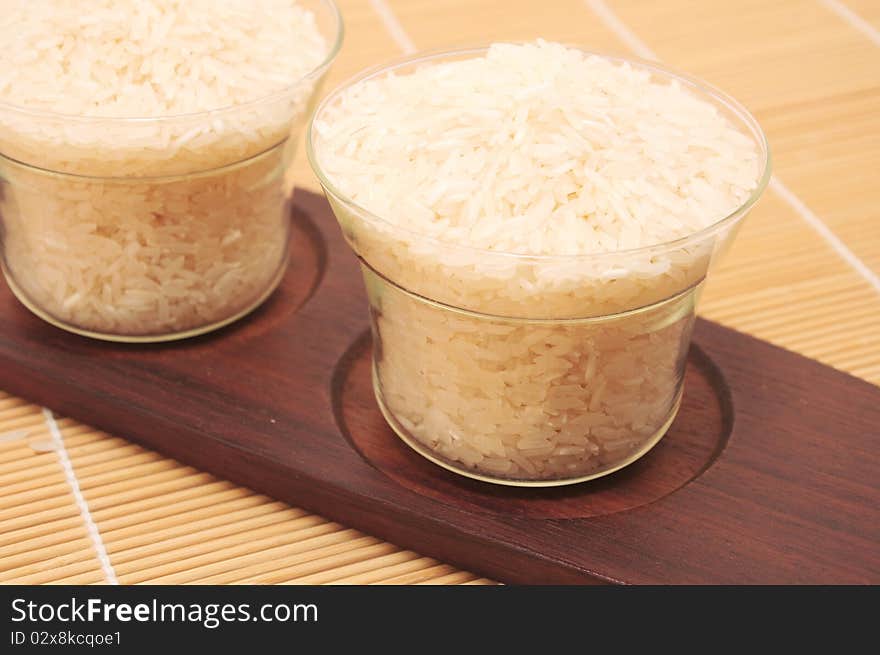 A bowl of  Rice with basil