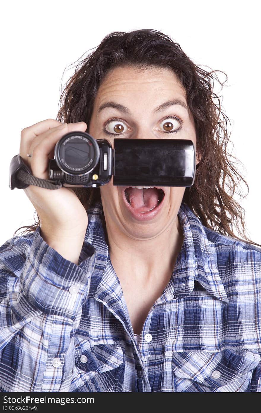 Woman watching video camera scared