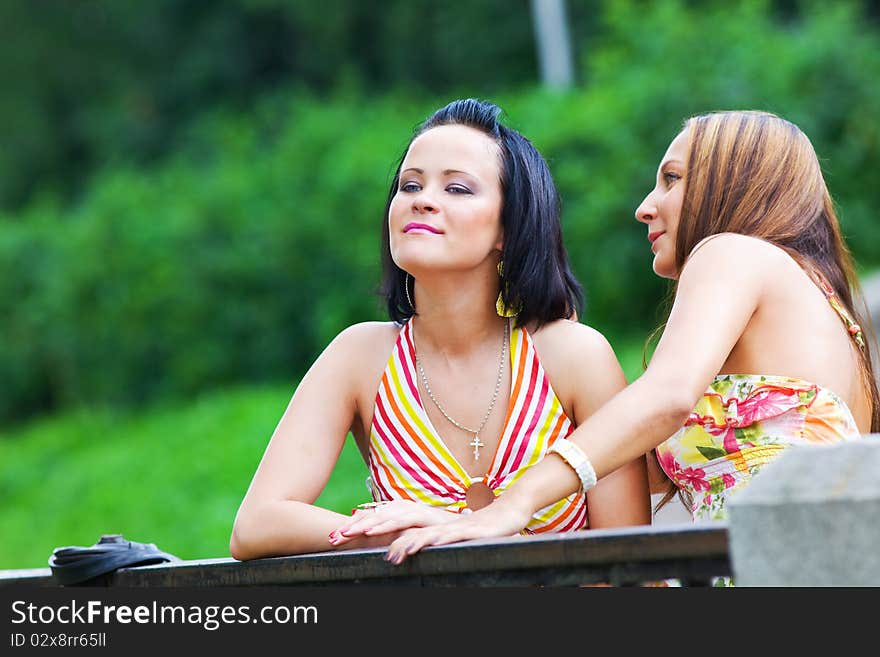 Two talking girls in the park