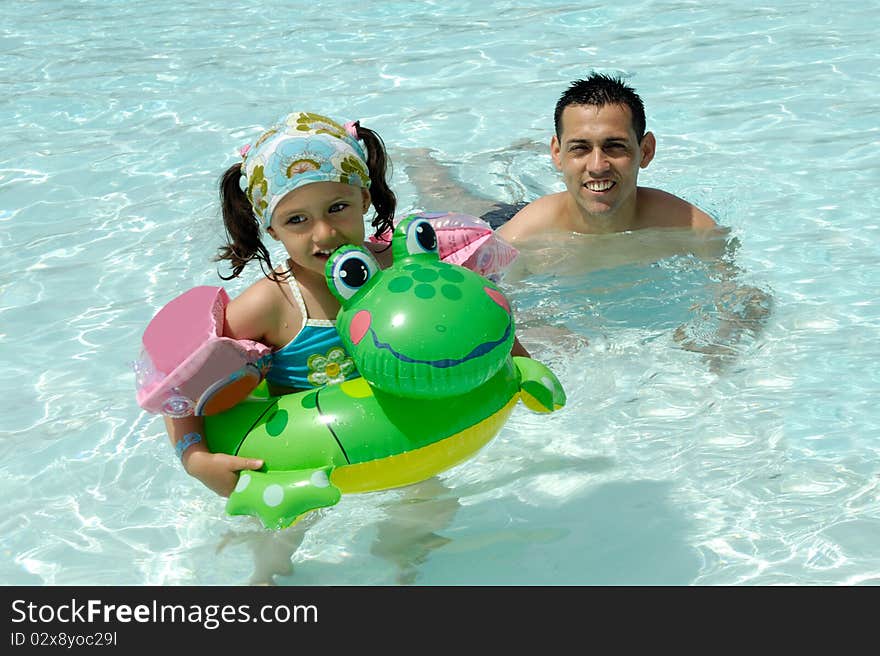 Happy man and child swimming. Happy man and child swimming