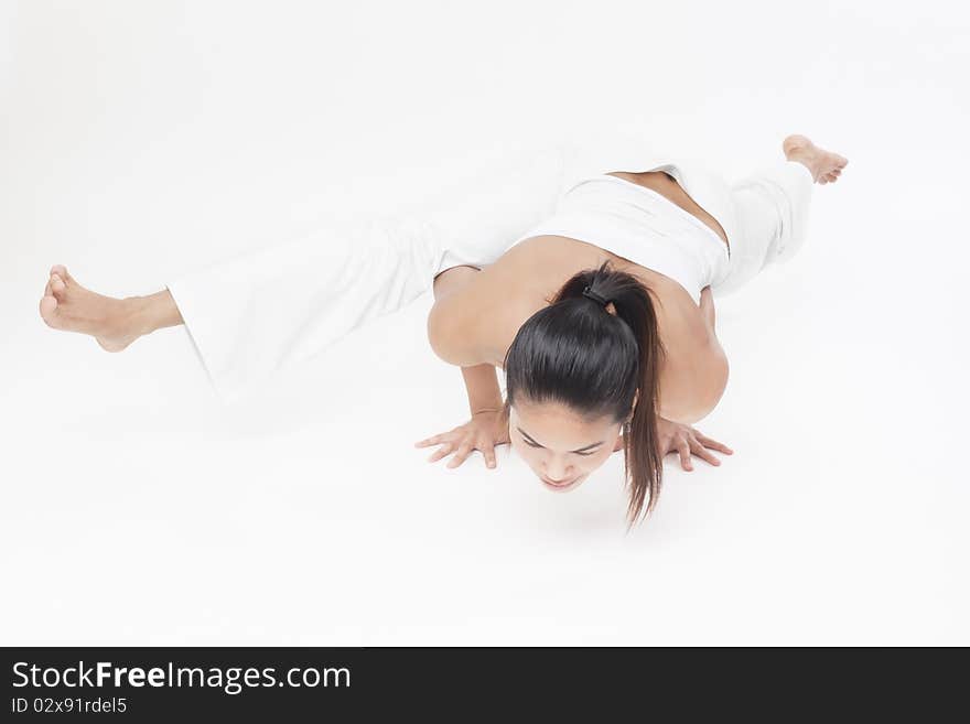 Professional yoga trainer in studio