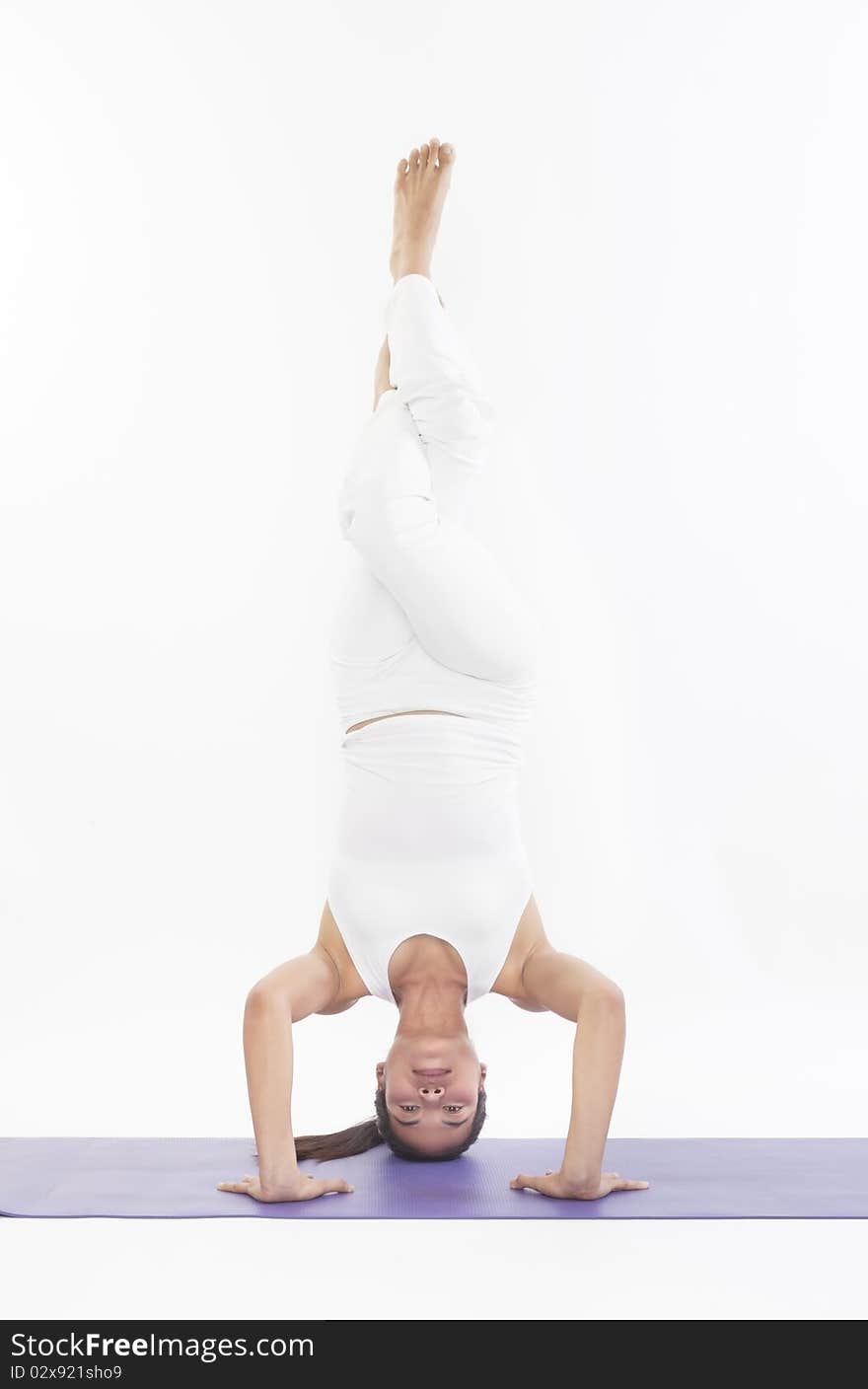 Professional yoga trainer in studio