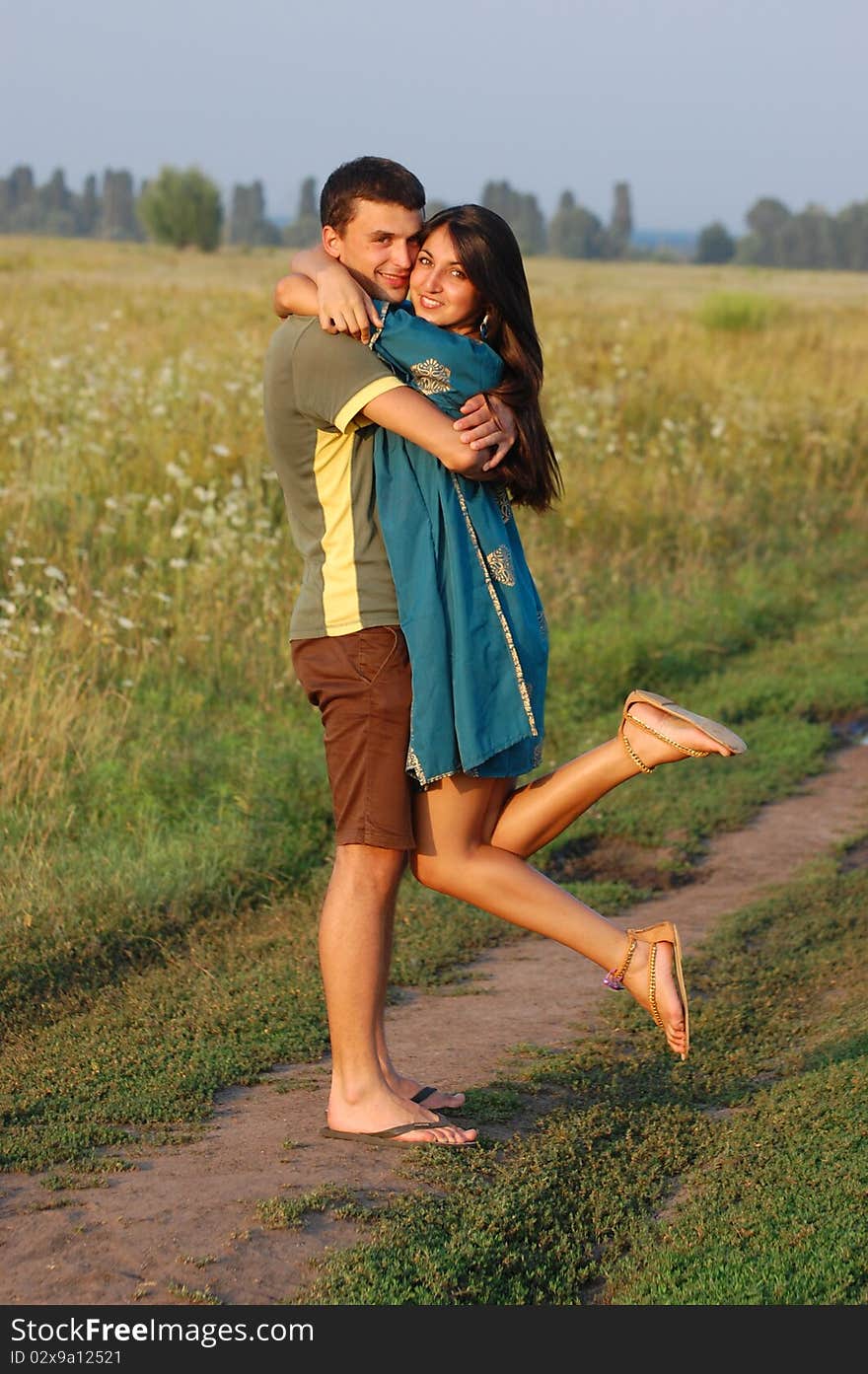 Pretty girl and handsome boy  outdoor at summer. Near Kiev,Ukraine. Pretty girl and handsome boy  outdoor at summer. Near Kiev,Ukraine