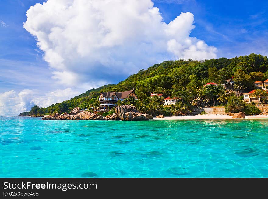 Hotel at tropical beach - vacation background