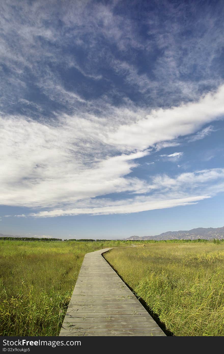 Blue sky,white cloud and winding road in china