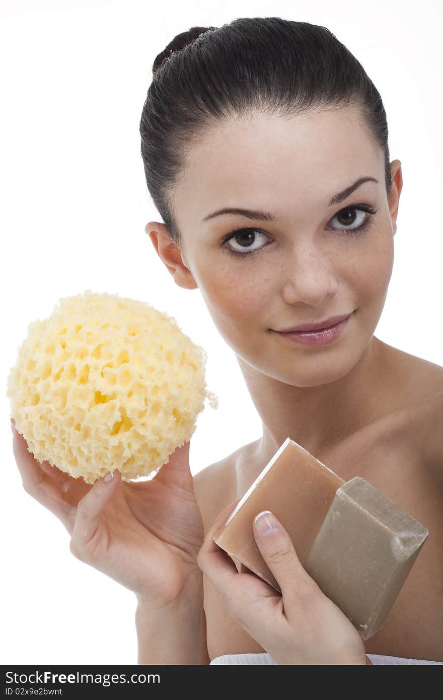 Beautiful young woman with aroma soap