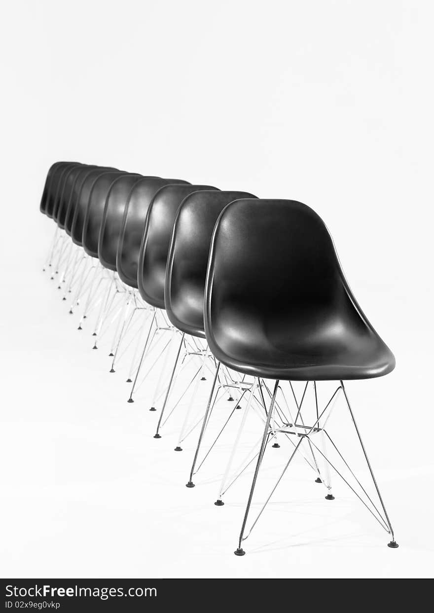 Black chairs in a row