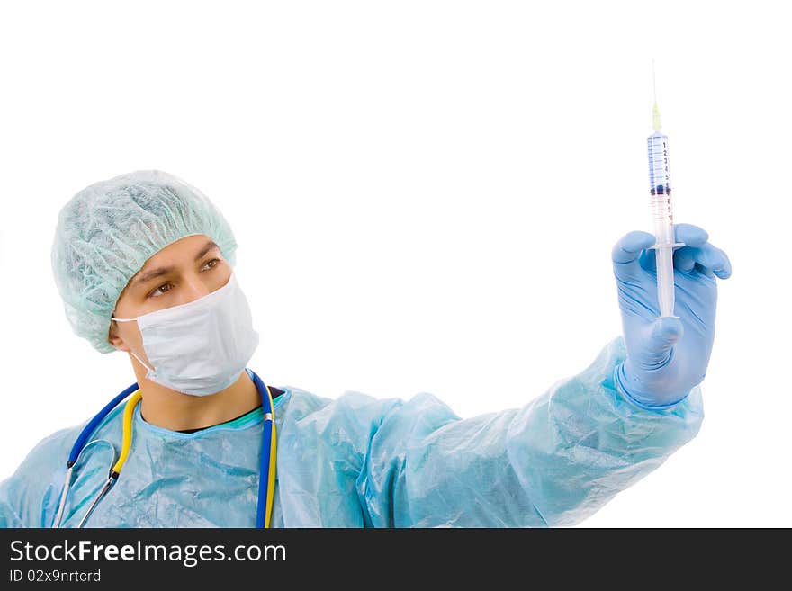 Young male surgeon with a medical syringe, isolated on white