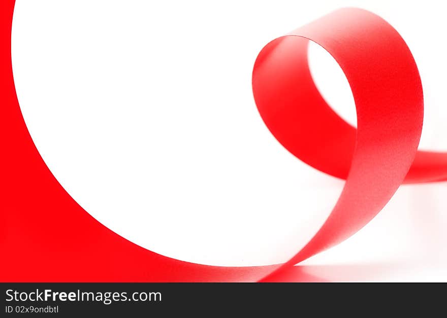 Red ribbon on white background