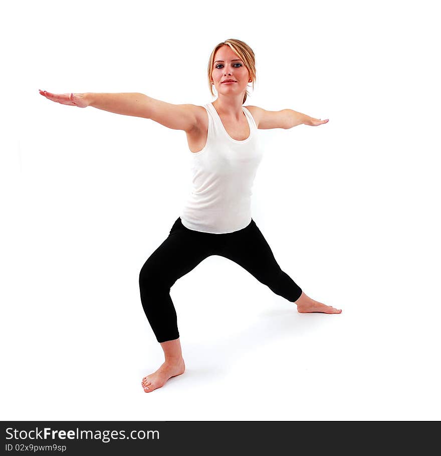 Beautiful girl practicing yoga on isolated white background