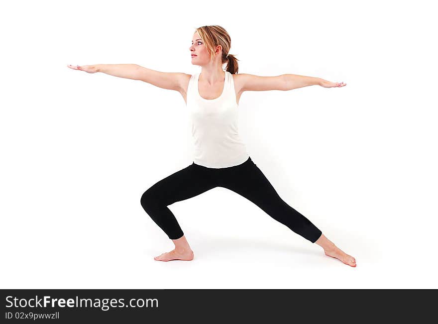 Beautiful girl practicing yoga on isolated white background