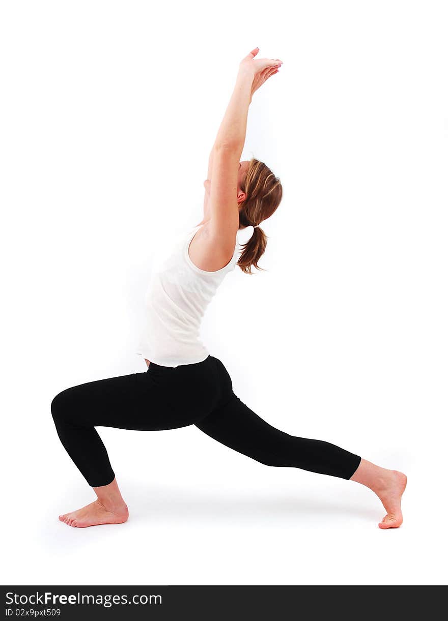 Beautiful girl practicing yoga on isolated white background