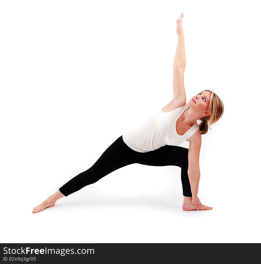 Beautiful girl practicing yoga on isolated white background