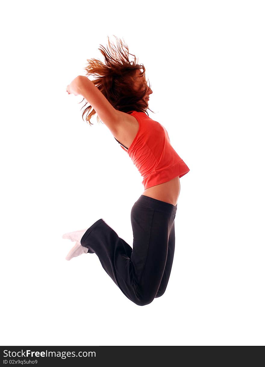 Attractive teenage dancing over white background