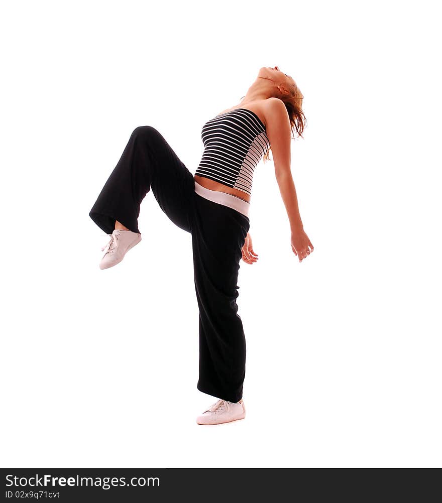 Attractive teenage dancing over white background