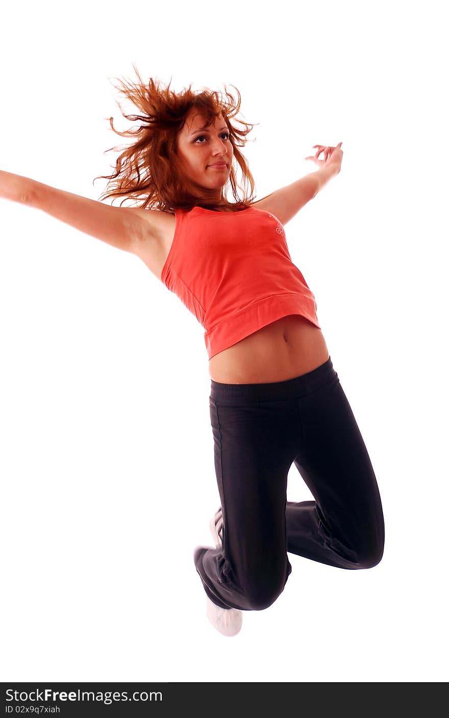 Attractive Teenage Dancing Over White Background