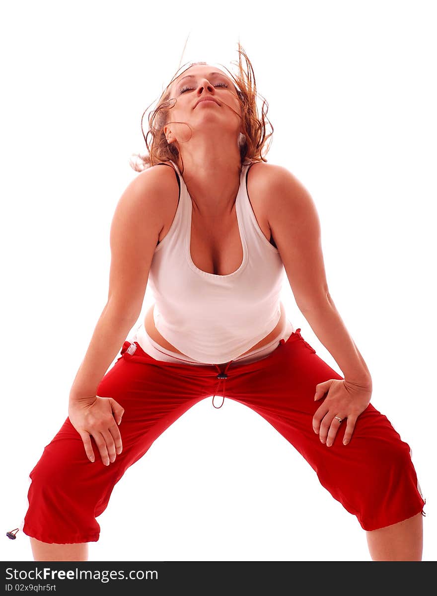 Attractive teenage dancing over white background