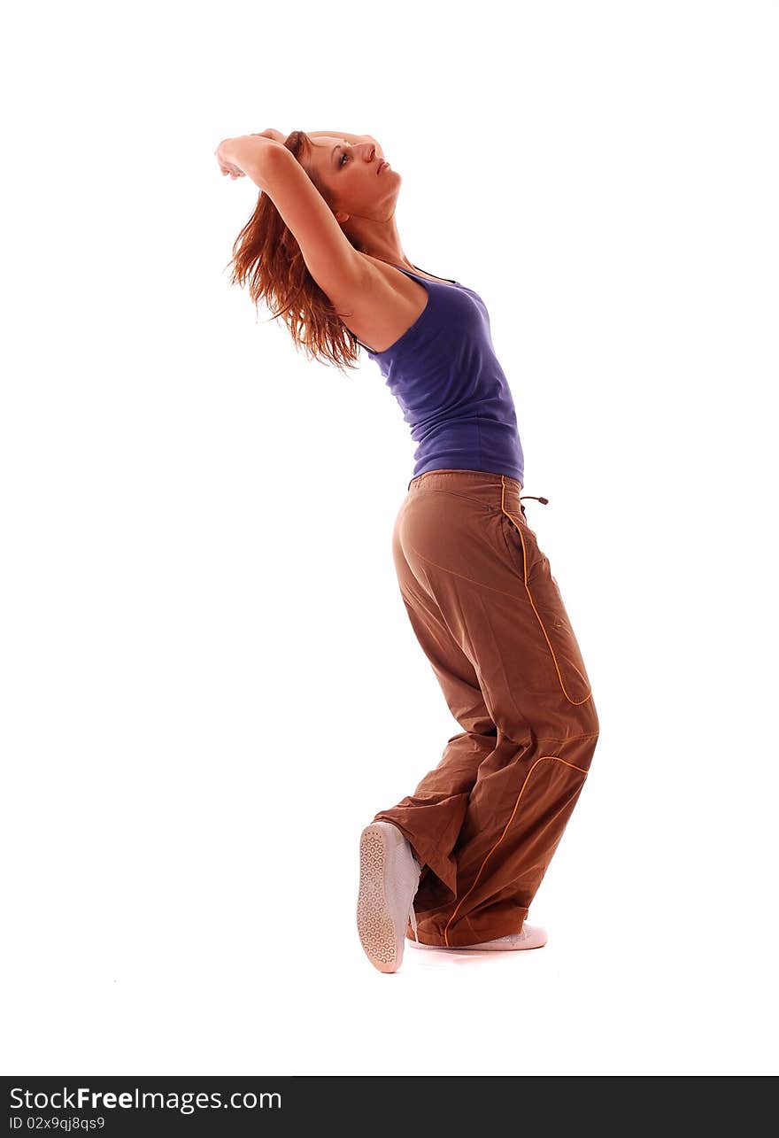 Attractive teenage dancing over white background