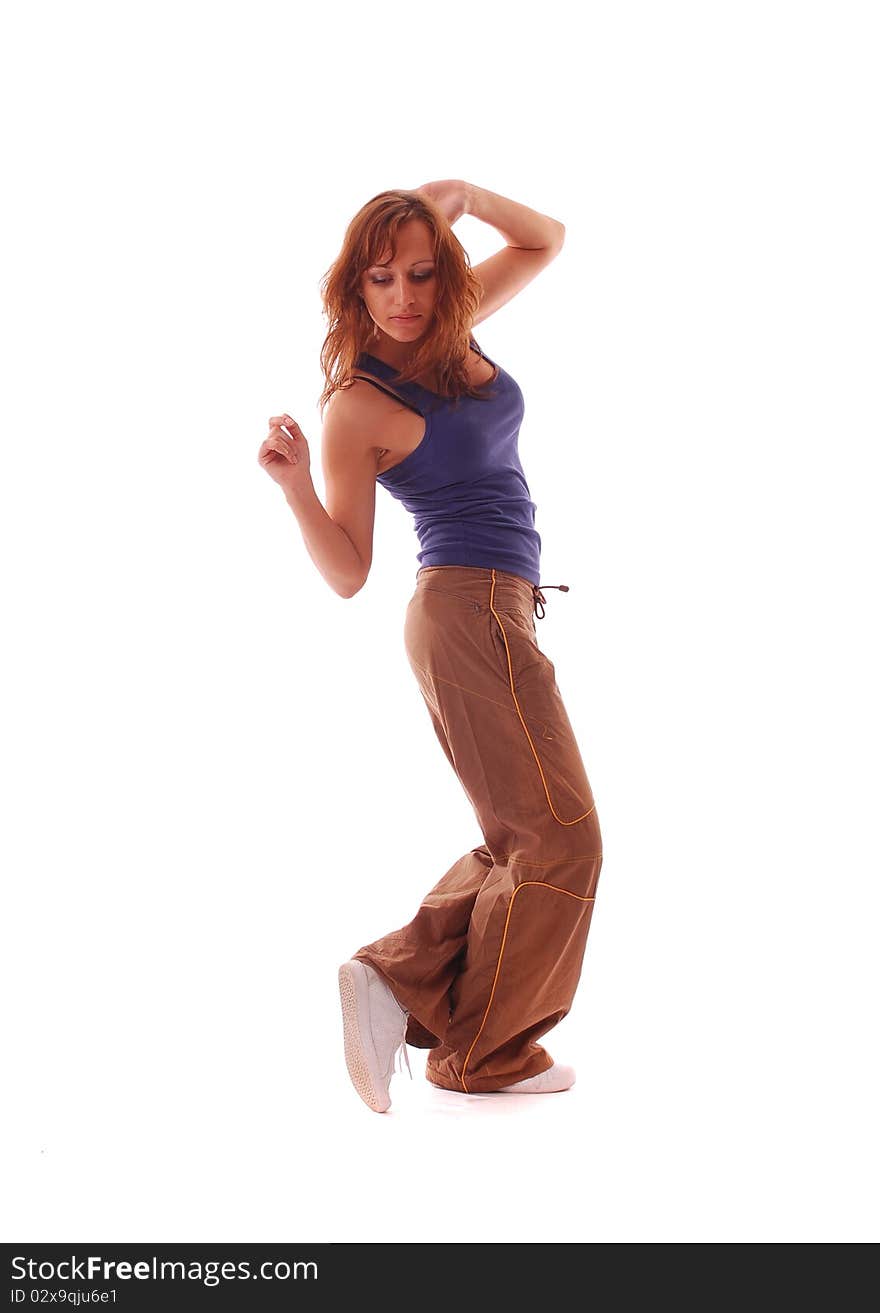 Attractive teenage dancing over white background