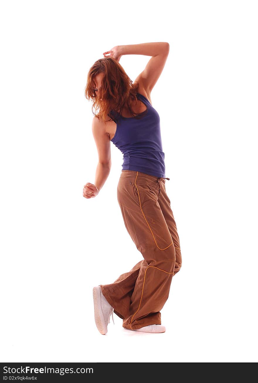 Attractive teenage dancing over white background