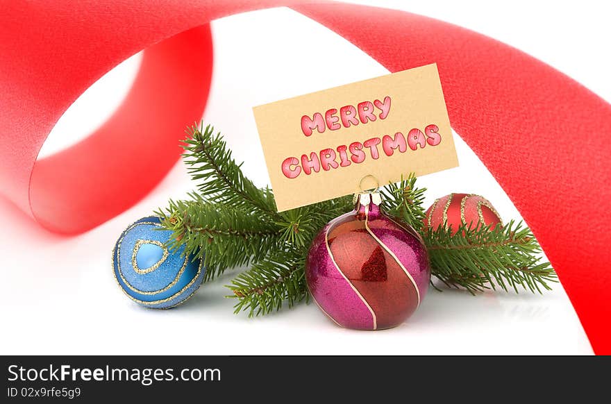 Christmas concept. Greeting card and Christmas ball and red ribbon