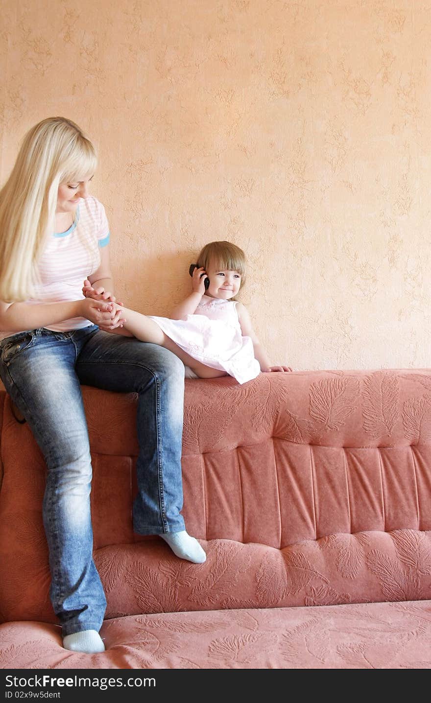 Loving mother and daughter at home