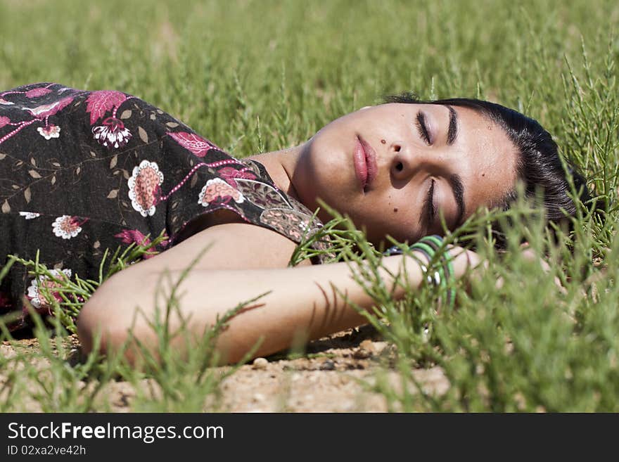 Girl Sleeping On Grass