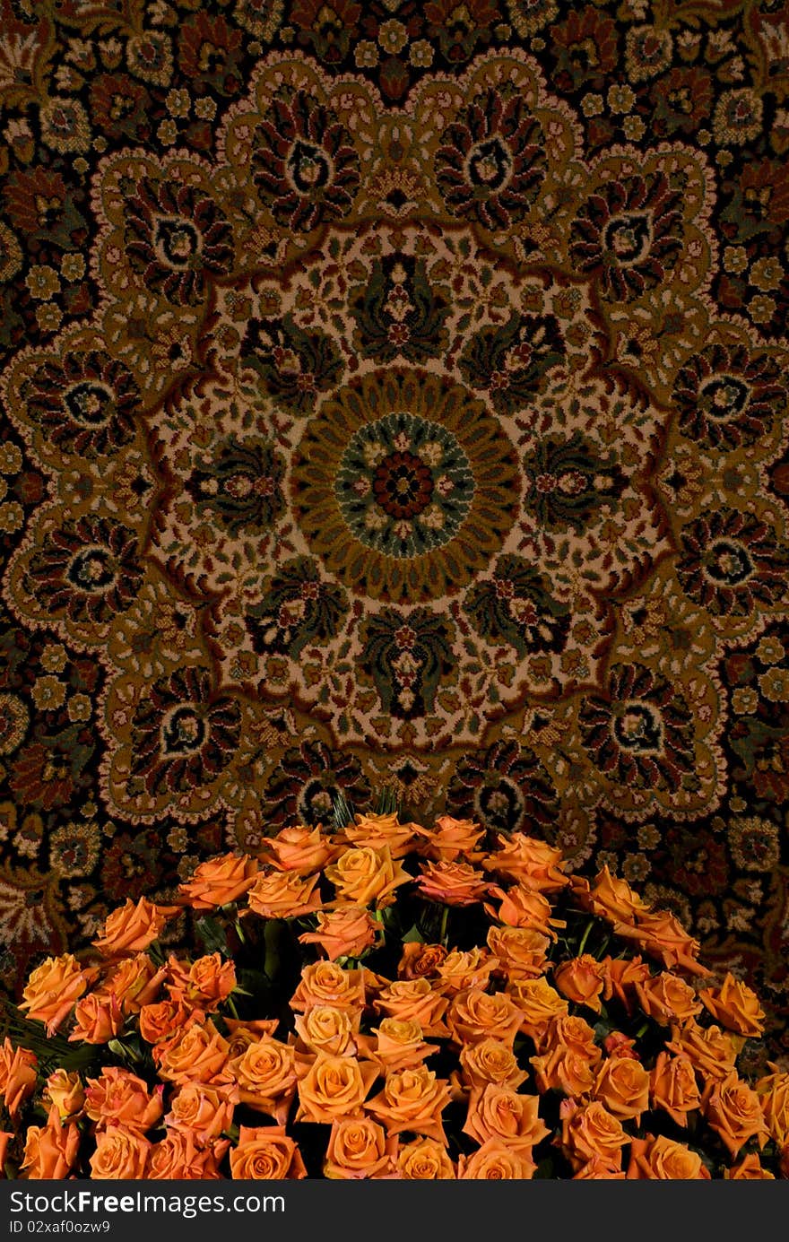 Brown carpet with graphics of diamonds and flowers