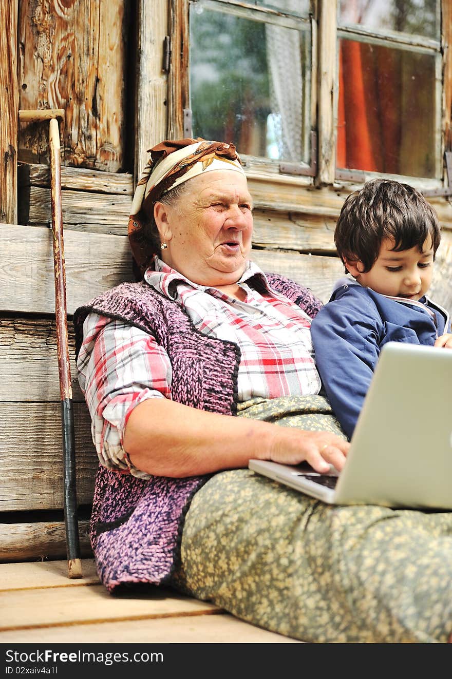 Senior aged woman with laptop