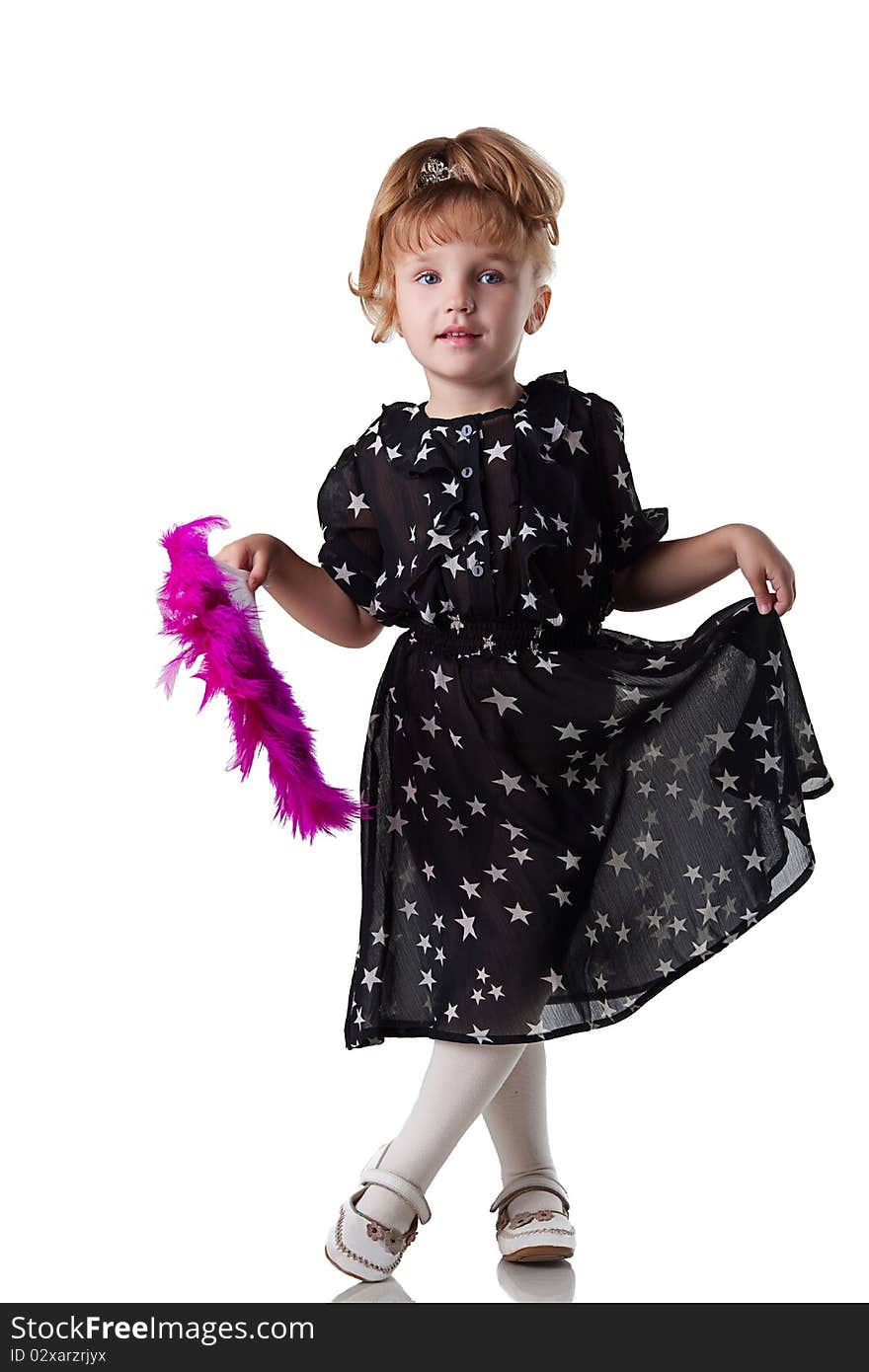 Little girl dances with a fan , with white background