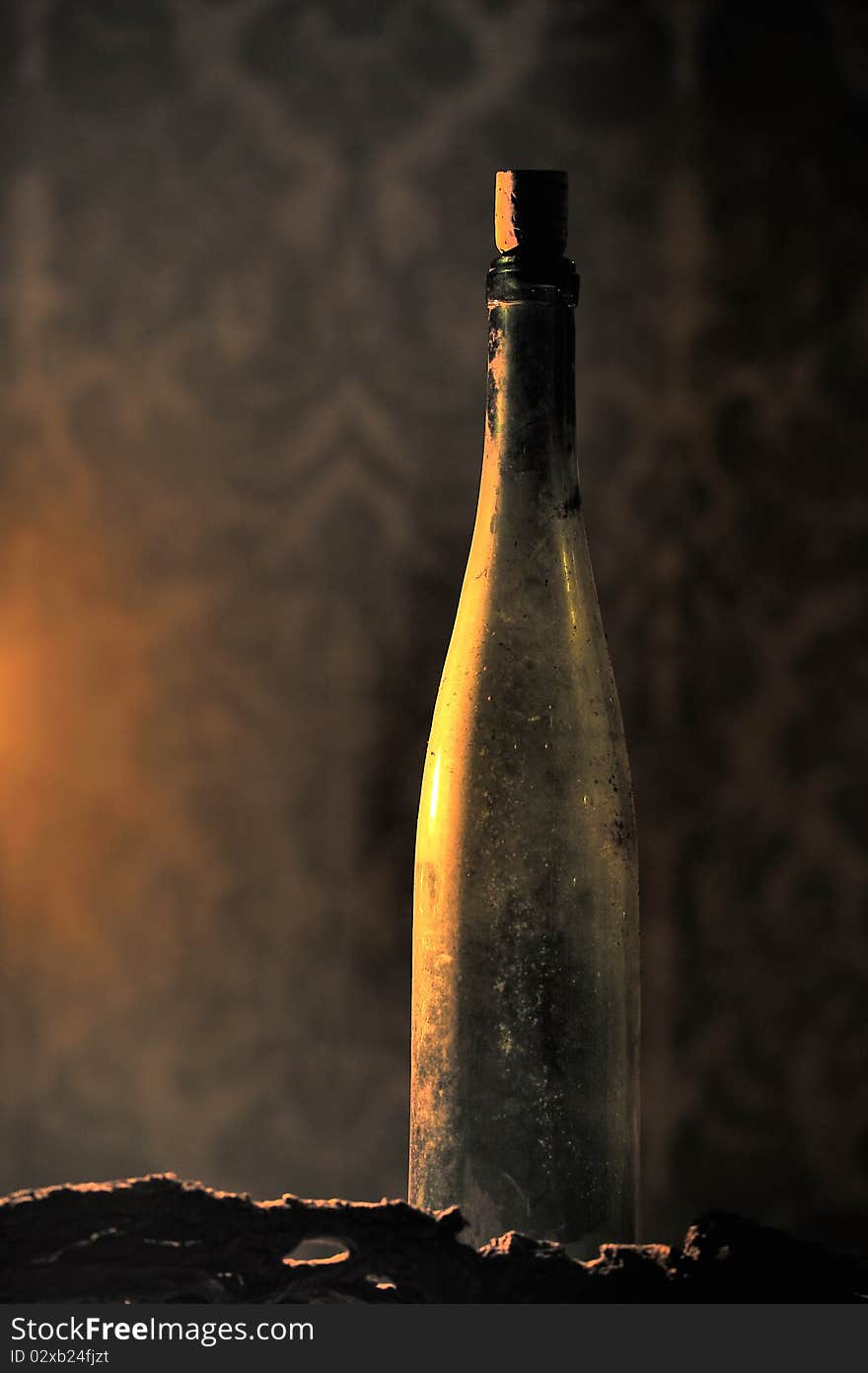 Candle Lighted Bottle Of Wine