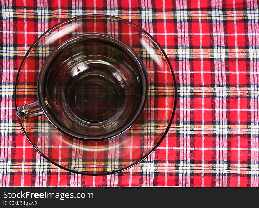 Empty glass tea cup isolated