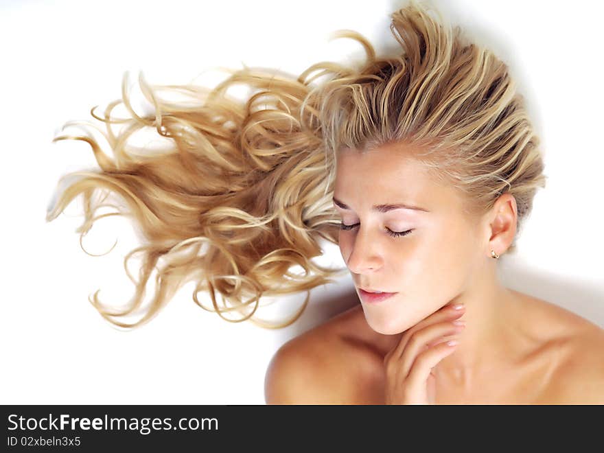 Beautiful blonde female close up studio shot. Beautiful blonde female close up studio shot