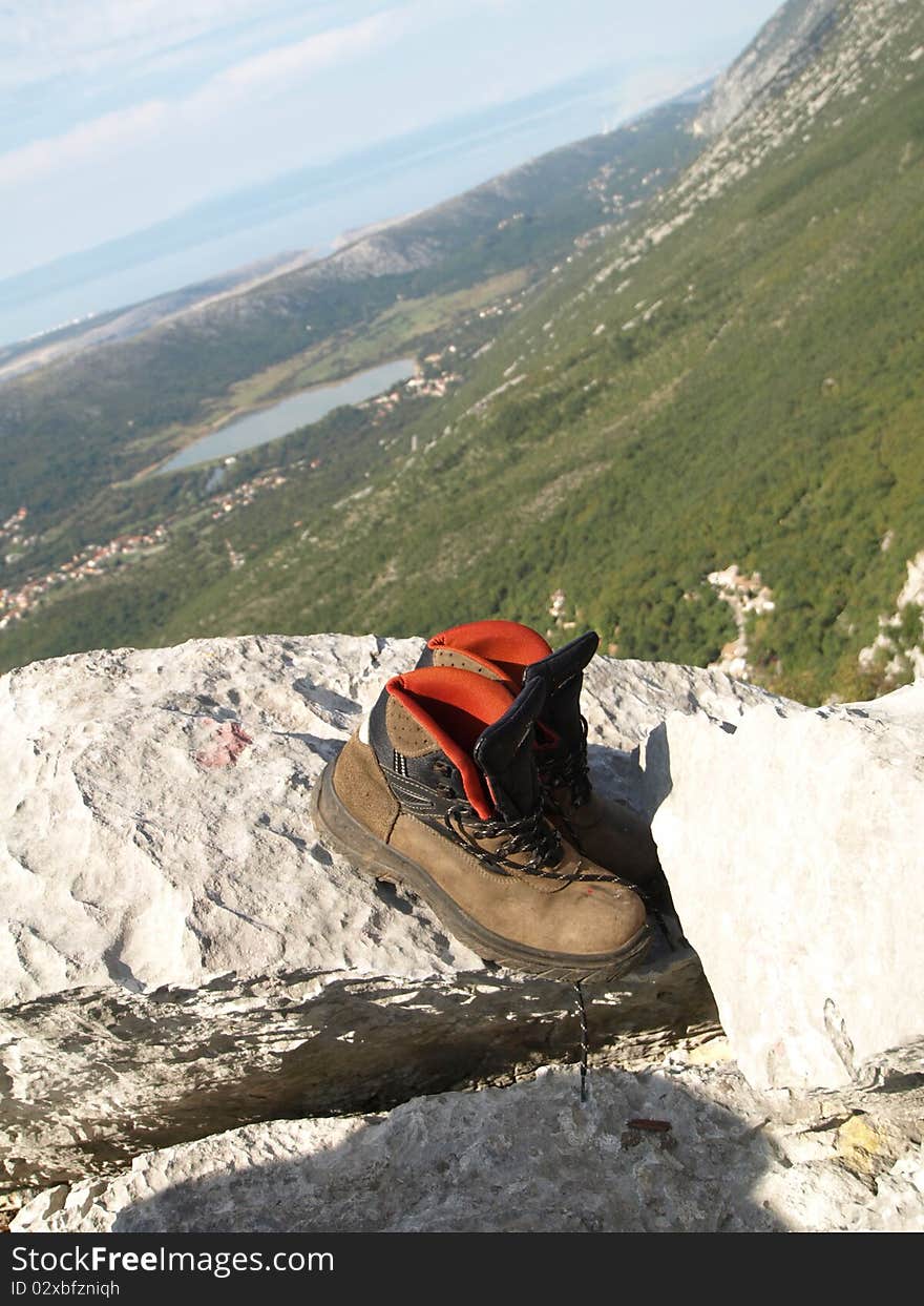 Tracking on mountains, boots for tracking on mountains peak, active life for good health, walking in nature