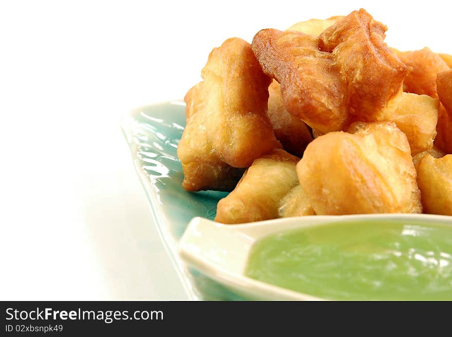 Deep-fried doughstick with local coffee