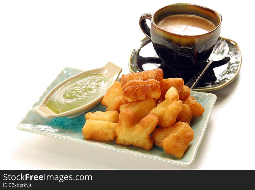 Deep-fried doughstick with local coffee