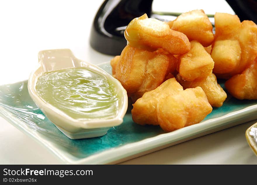 Deep-fried doughstick with local coffee