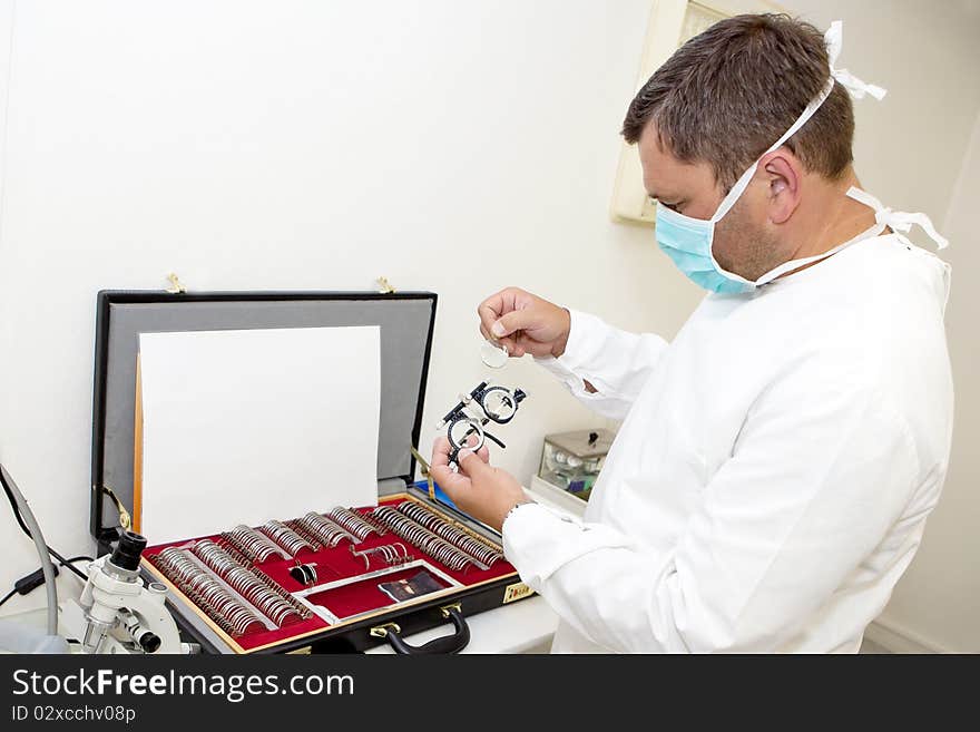 Man doctor in ophthalmology clinic