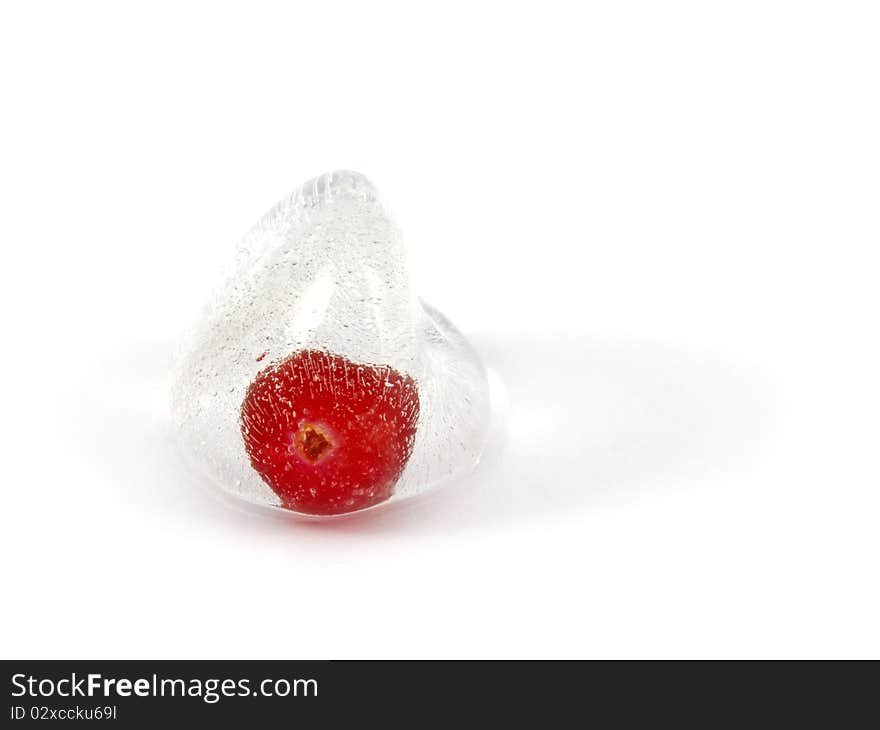 Cranberries in ice on a white background.