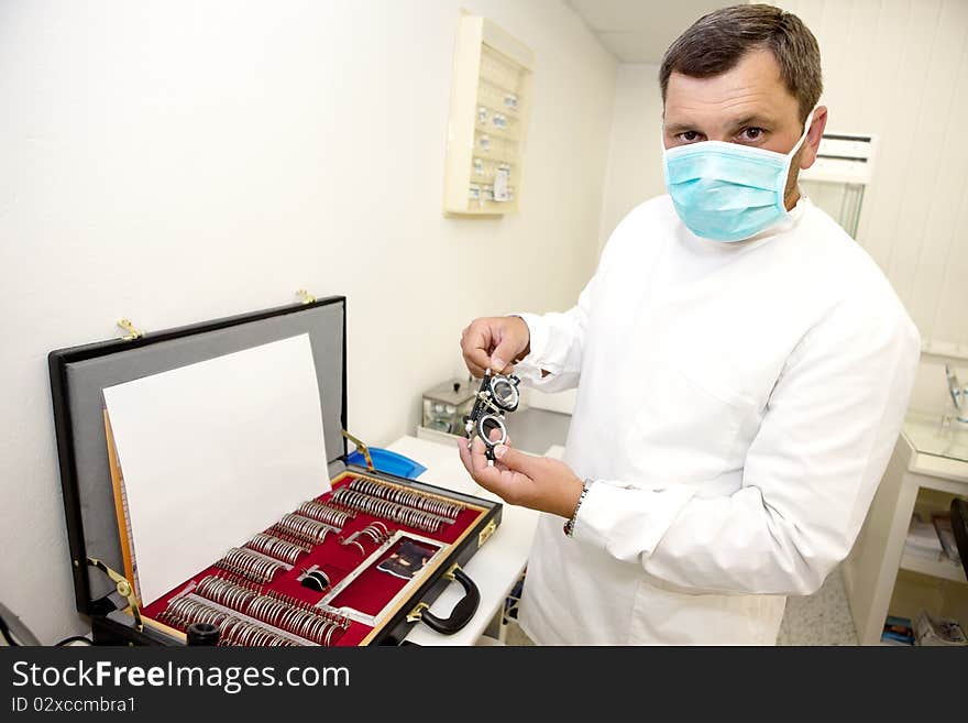 Man doctor in ophthalmology clinic