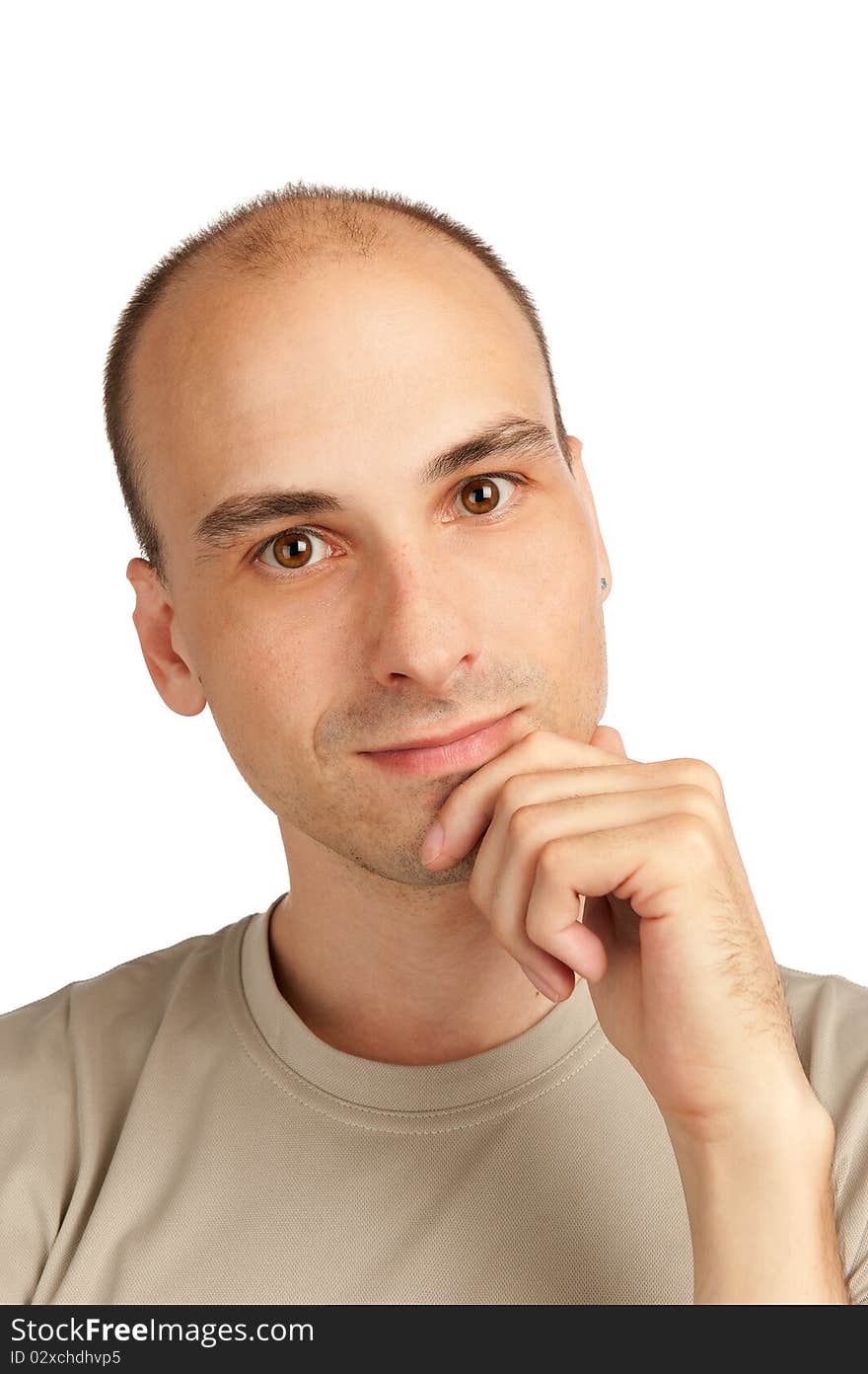 Closeup of a handsome young man thinking