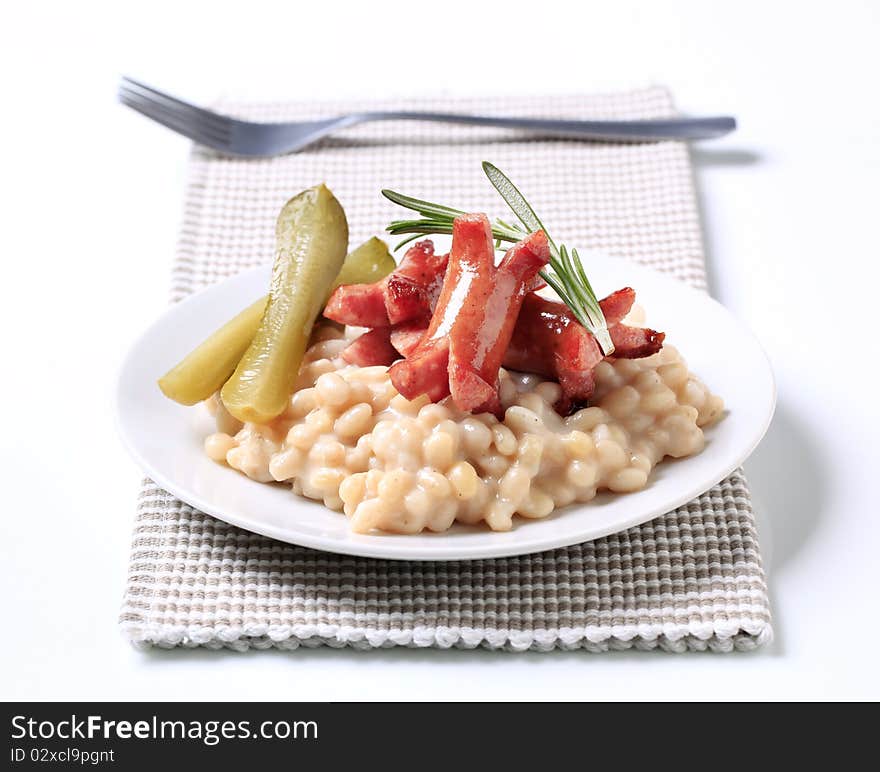 White bean salad with sausages