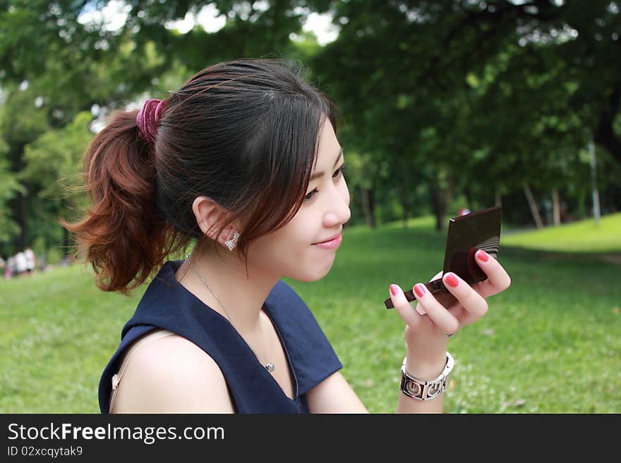 Young adult woman look mirror