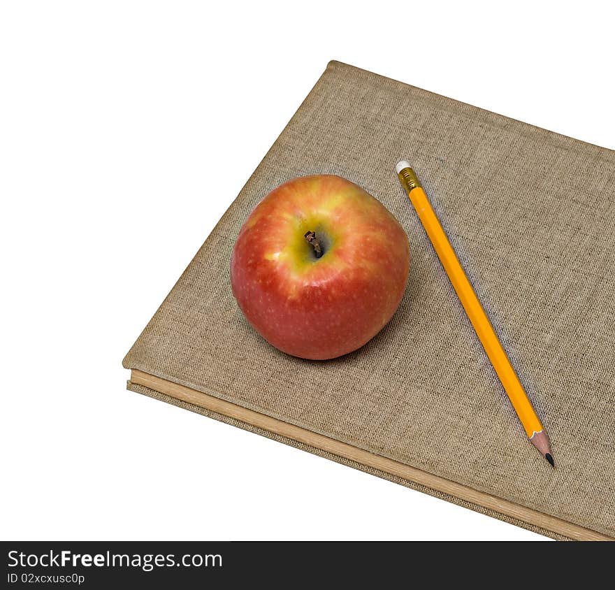 Red apple and pencil on pile of books. Red apple and pencil on pile of books