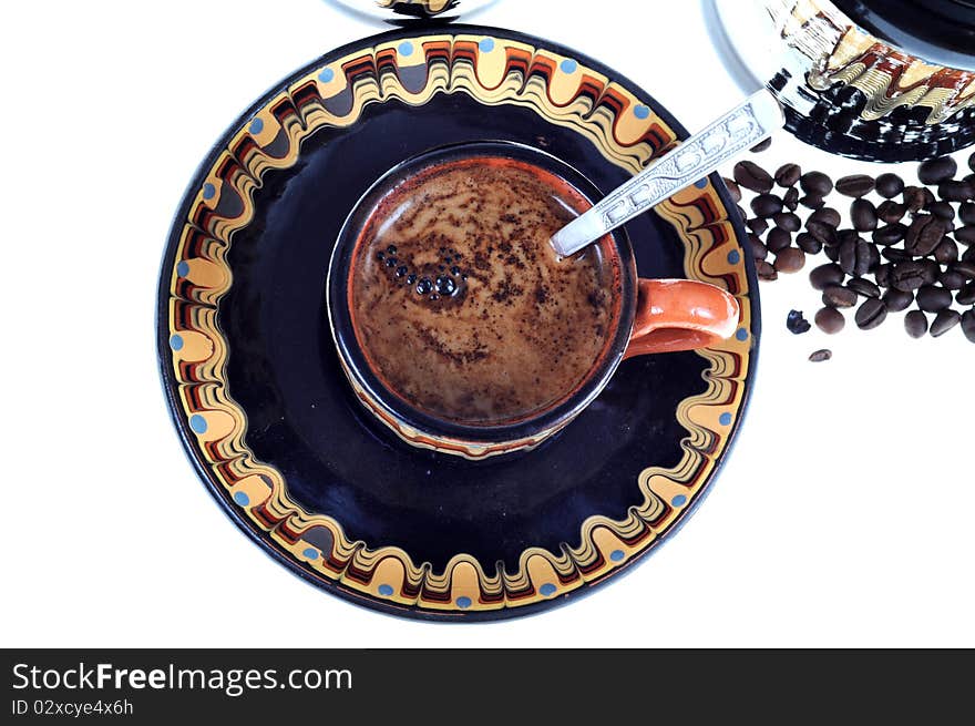 Caffee cup and beans isolated on white background. Caffee cup and beans isolated on white background