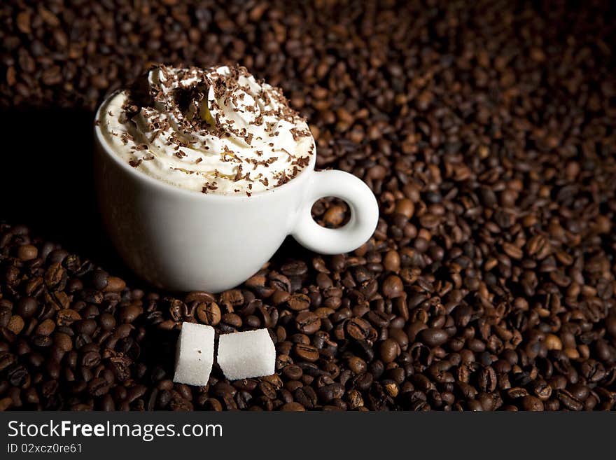 Cappuccino in coffee beans