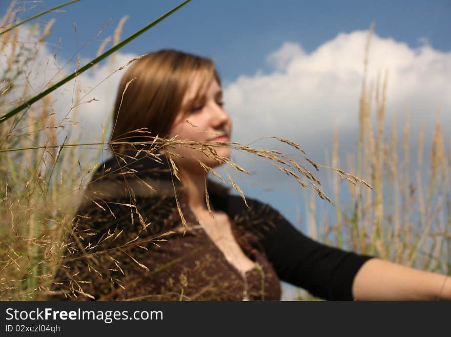 Young woman in the grass