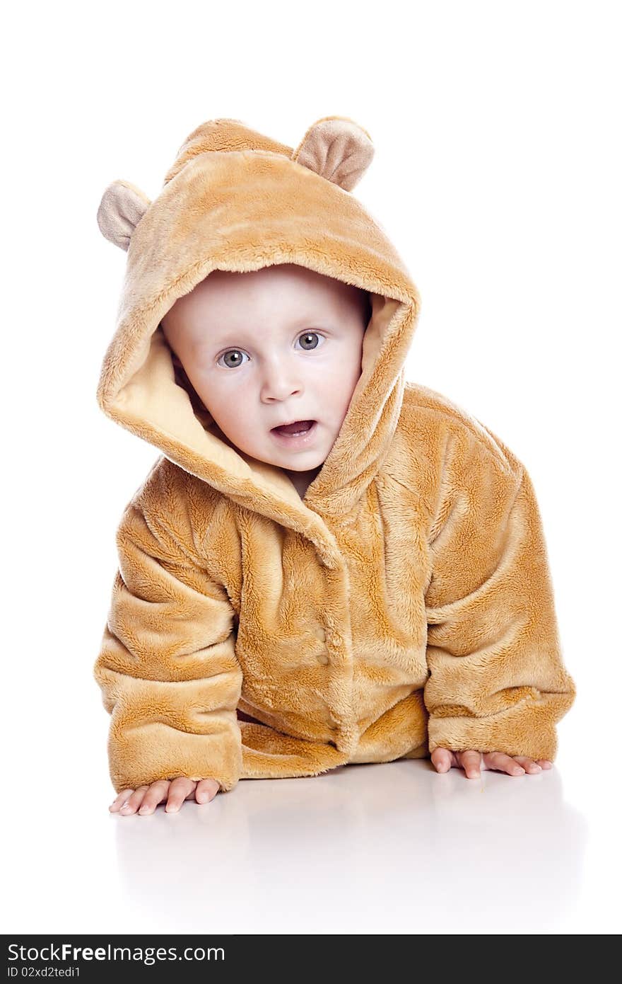 Cute little boy with a warm coat on white background