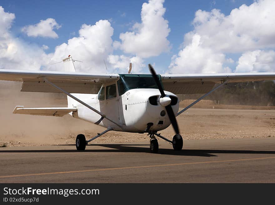 Small airplane in a small desert airport